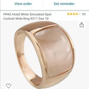 Simulated opal gold tone ring